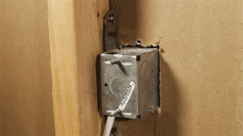 metal electrical box broke in wall|loose outlet box inside wall.